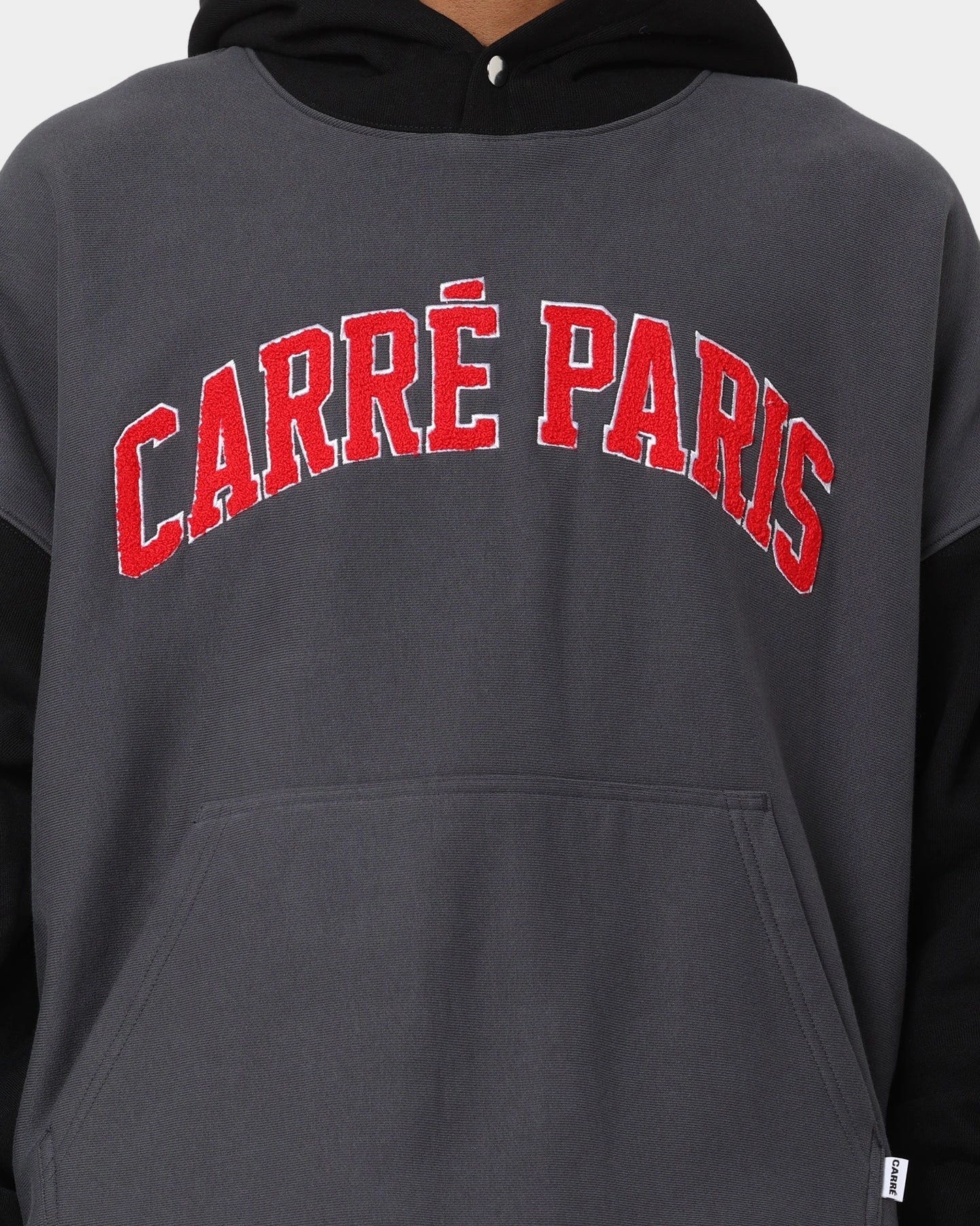 Charm beach bonfire Carre Team Two Tone Oversized Hoodie Black