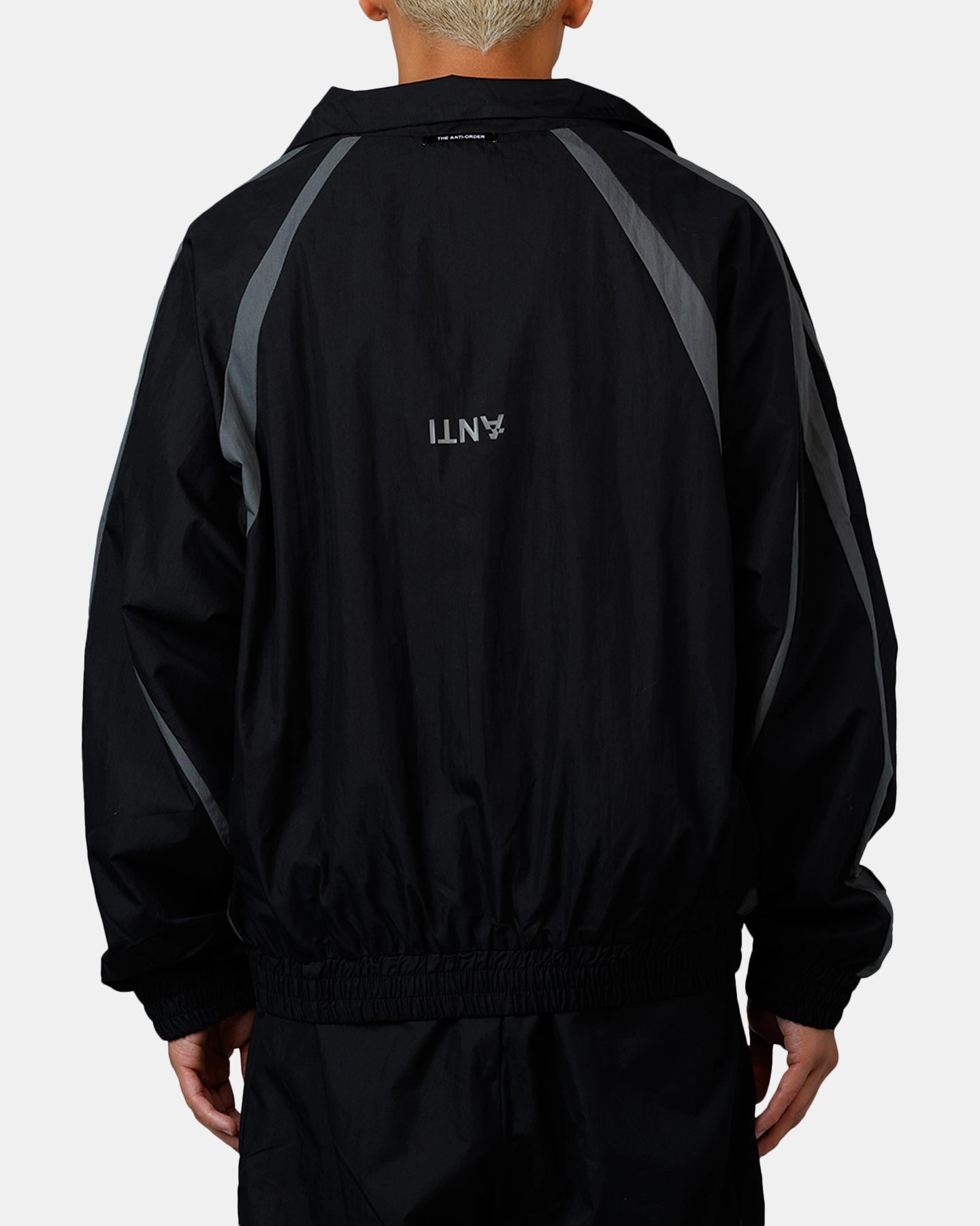 The Anti Order Acolyte Windbreaker Jacket Black/Grey Sticker