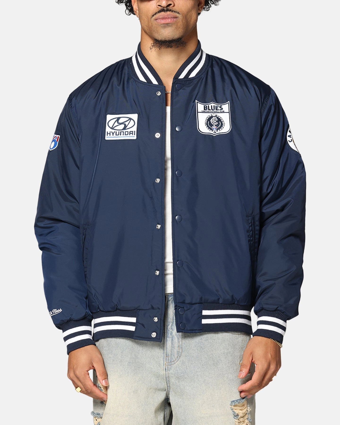 Reinforced Stress Points Rugged Durability Mitchell & Ness Carlton Blues Team Bomber Jacket Navy