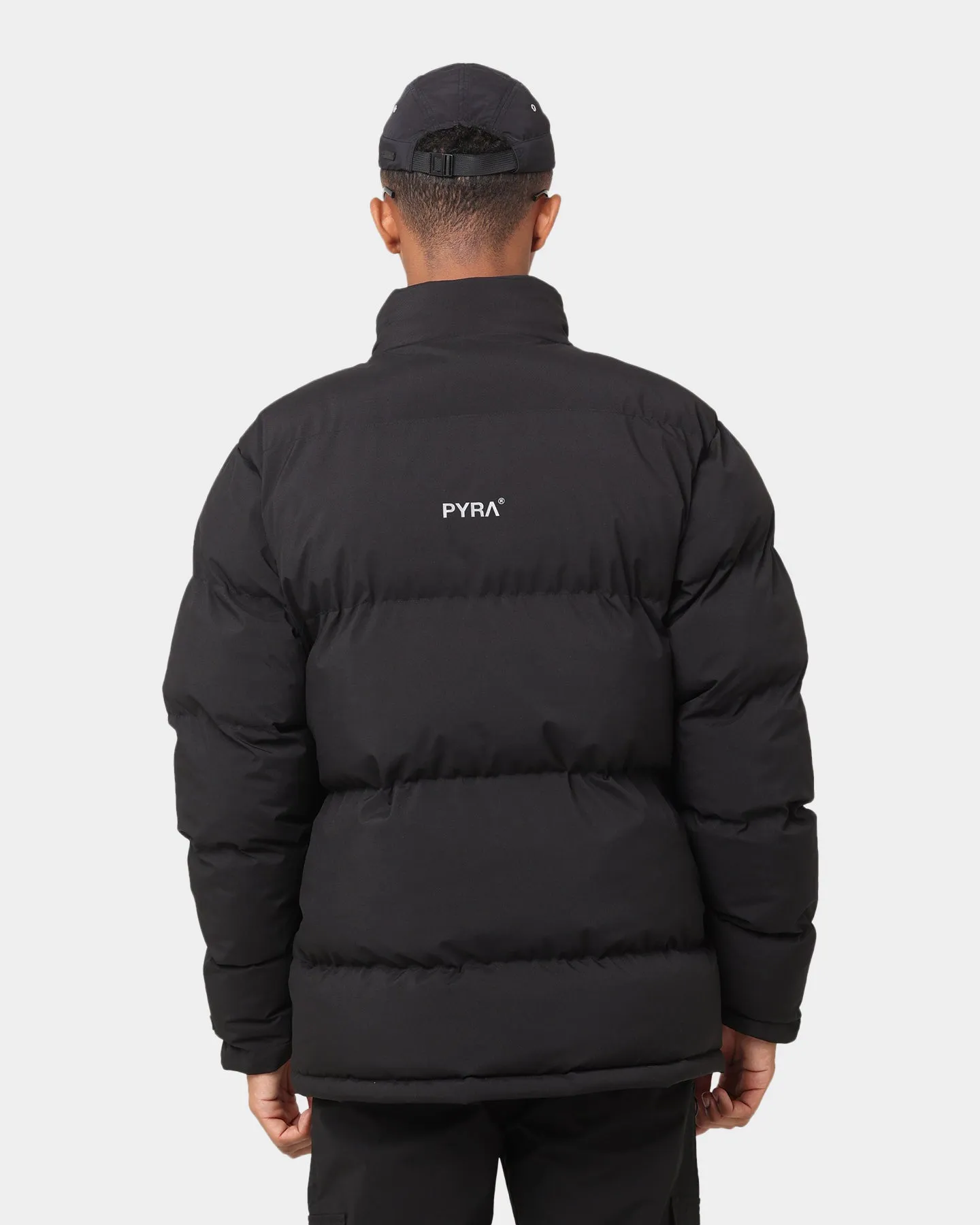 PYRA Padded Puffa Jacket Black Articulated Seams Instance