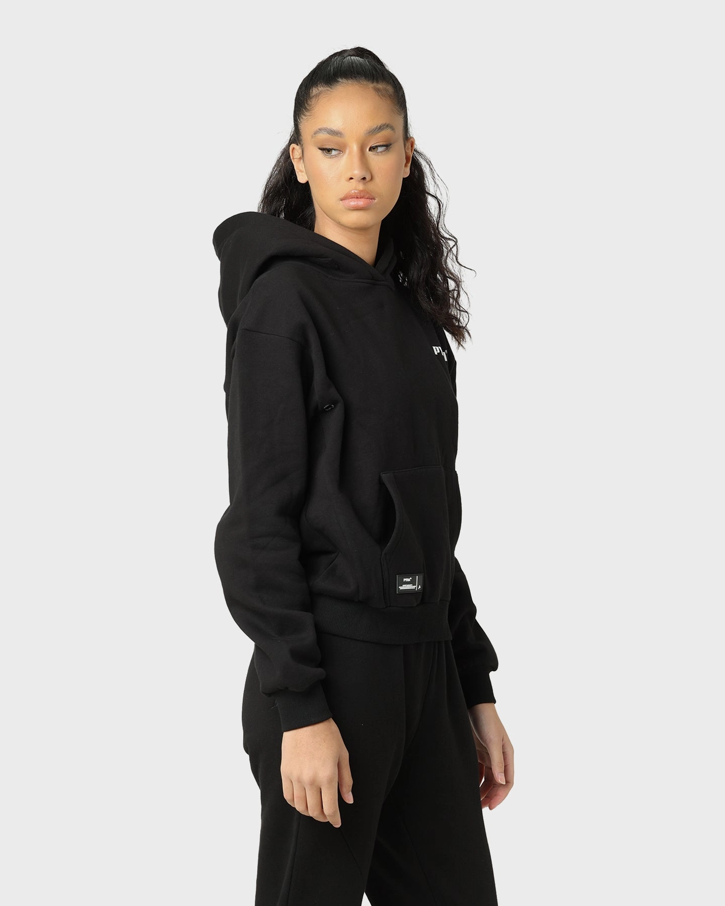 PYRA Women's Optimism Hoodie Black/White Articulated Sleeve Cut Ceremony