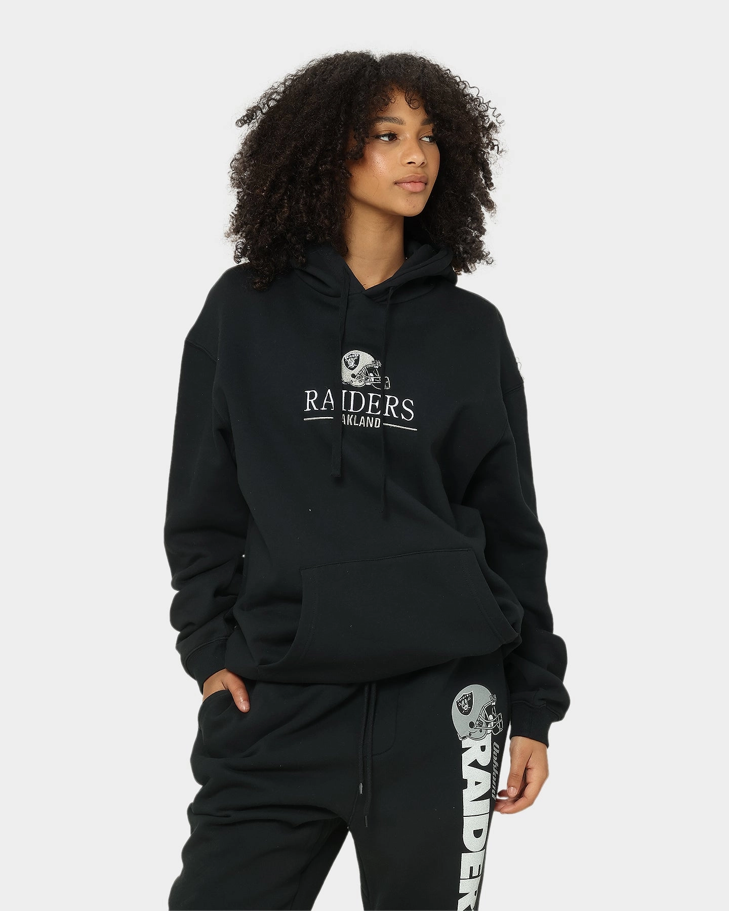Mitchell & Ness Oakland Raiders Helmet Stack Hoodie Black UltraLight Packable Design artists