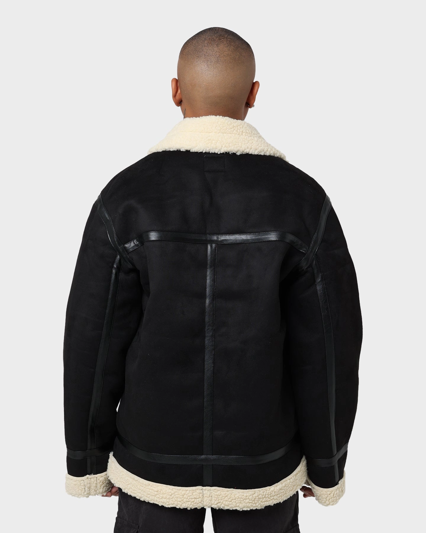 color - coordinating Emblem Karl Kani Retro Faux Shearling Jacket Black