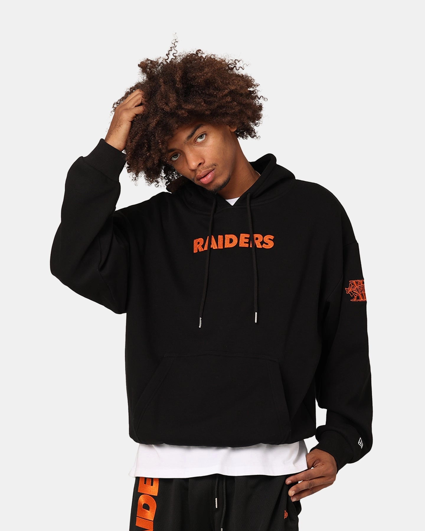 New Era Las Vegas Raiders 'Scary Nights' Oversized Hoodie Black/Orange design Eye - Catching