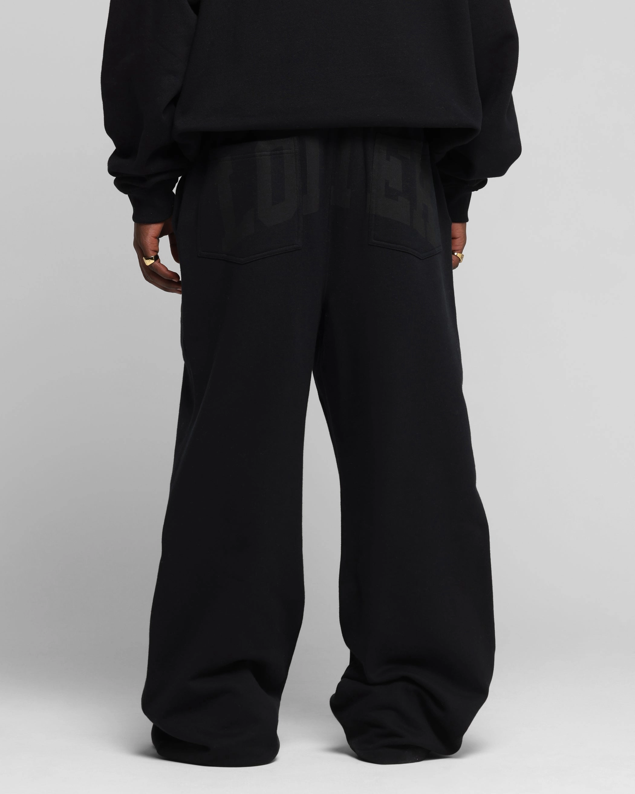 Minimal Edge Movement Ease Loiter Arch Premium Sweat Pants Black