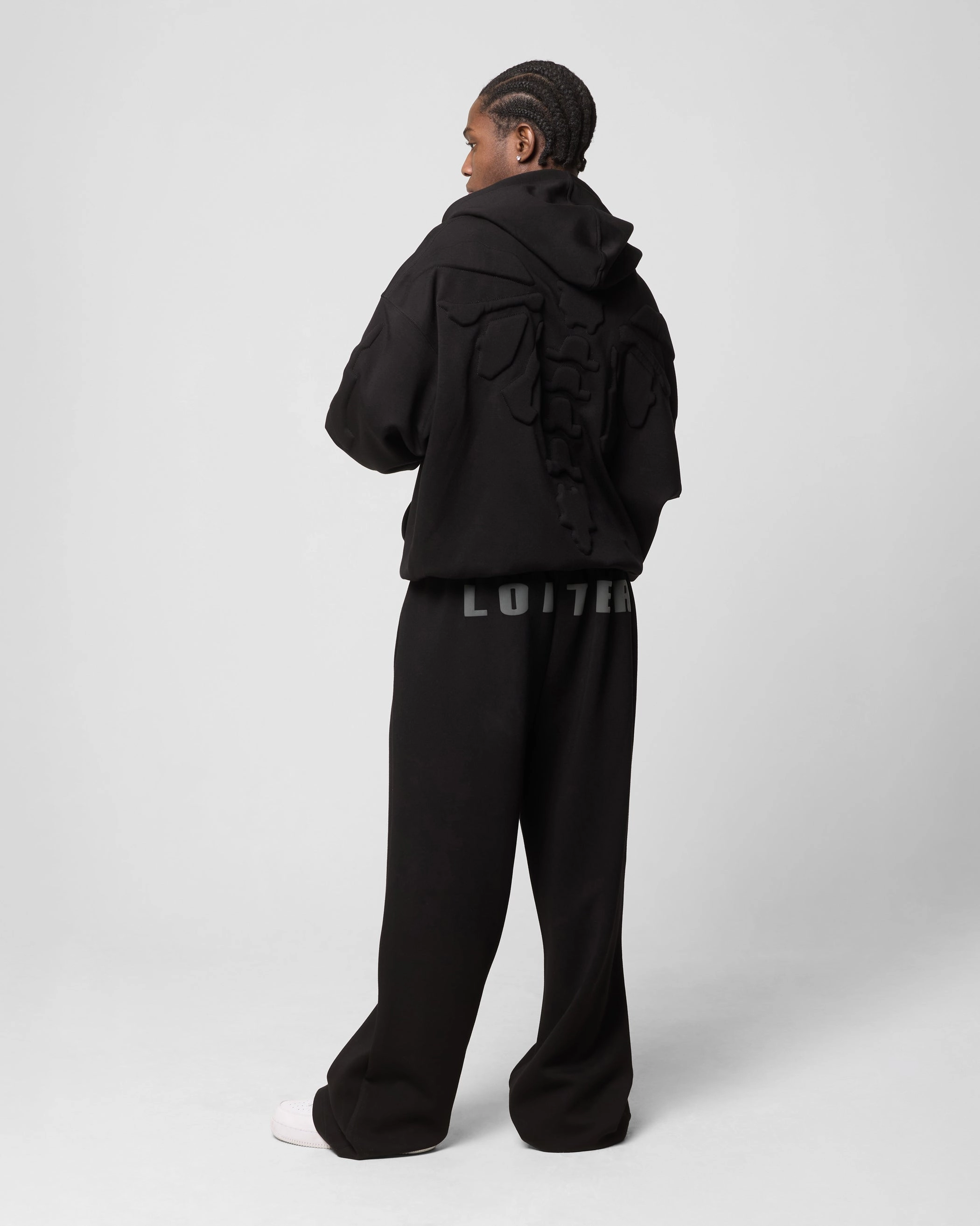 Loiter Sandevistan Hoodie Black school setting Reflective accents