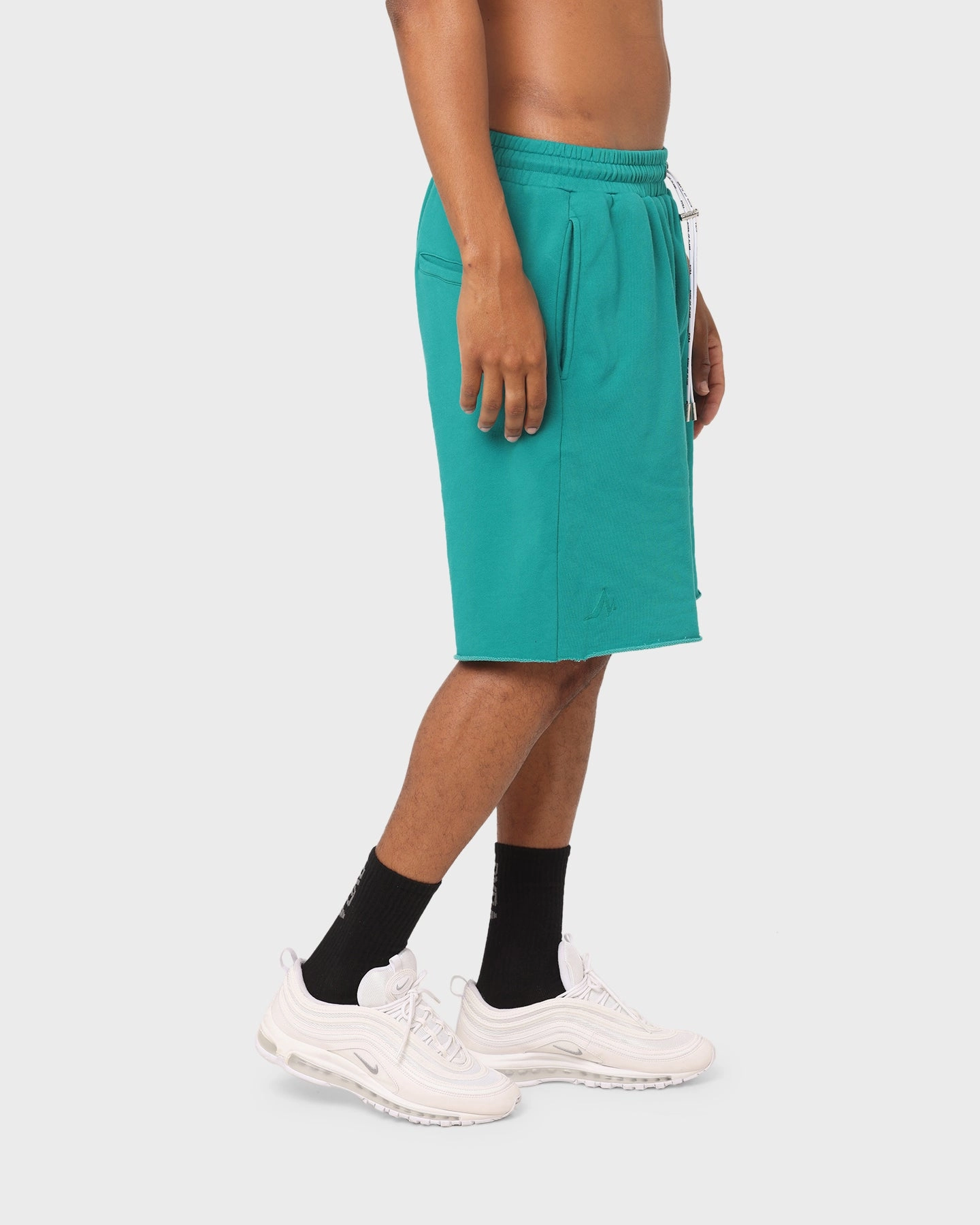 Convertible Length PYRA Raw Slouch Shorts Teal
