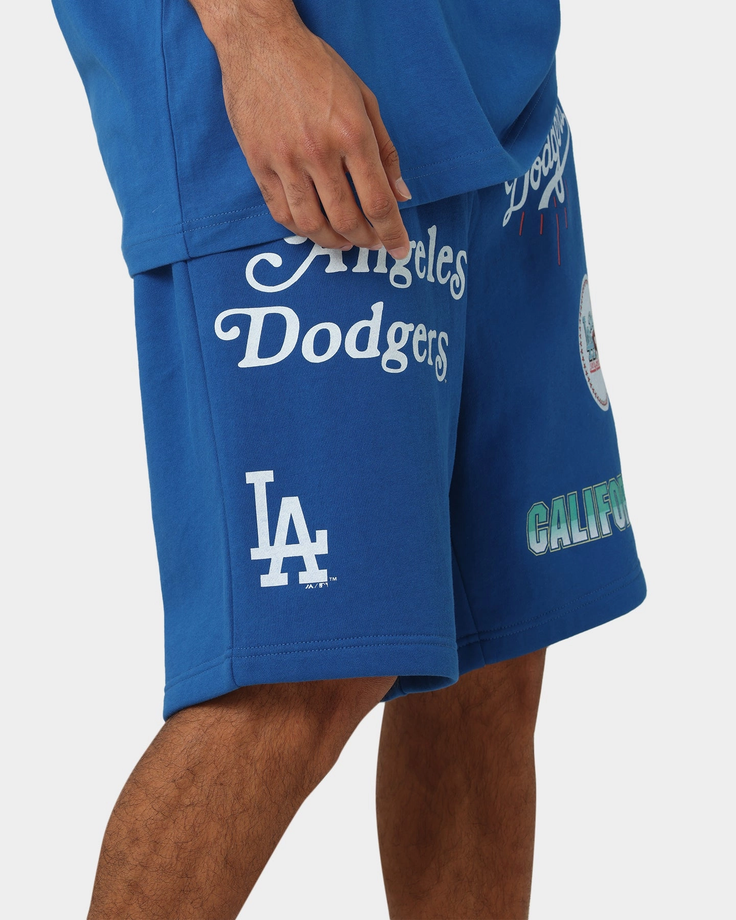 Majestic Athletic Los Angeles Dodgers Puff Print Patch Fleece Shorts Royal romper