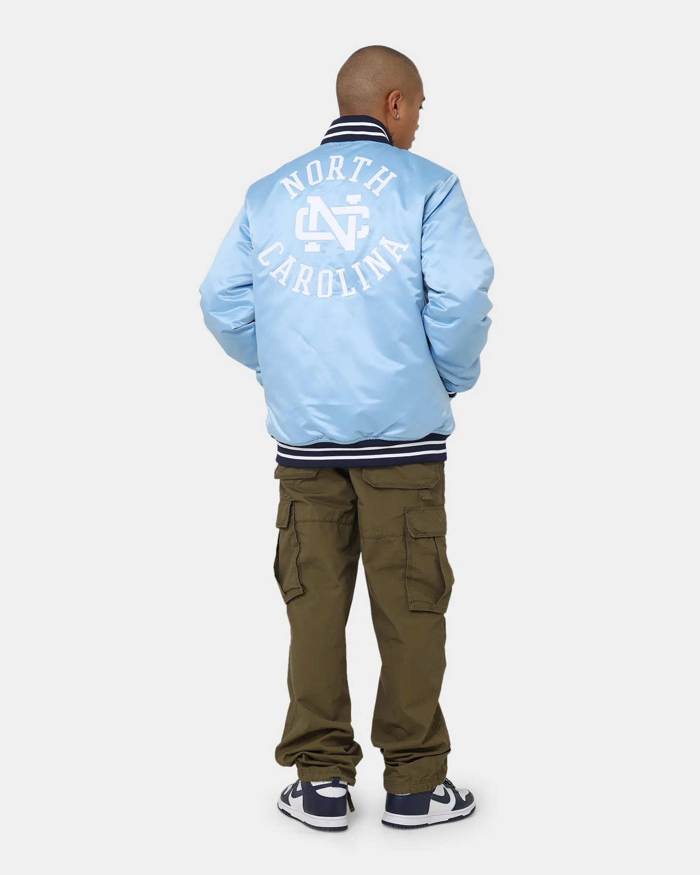 Mitchell & Ness University Of North Carolina Tar Heels Heavyweight Satin Jacket Light Blue waterproof Climb