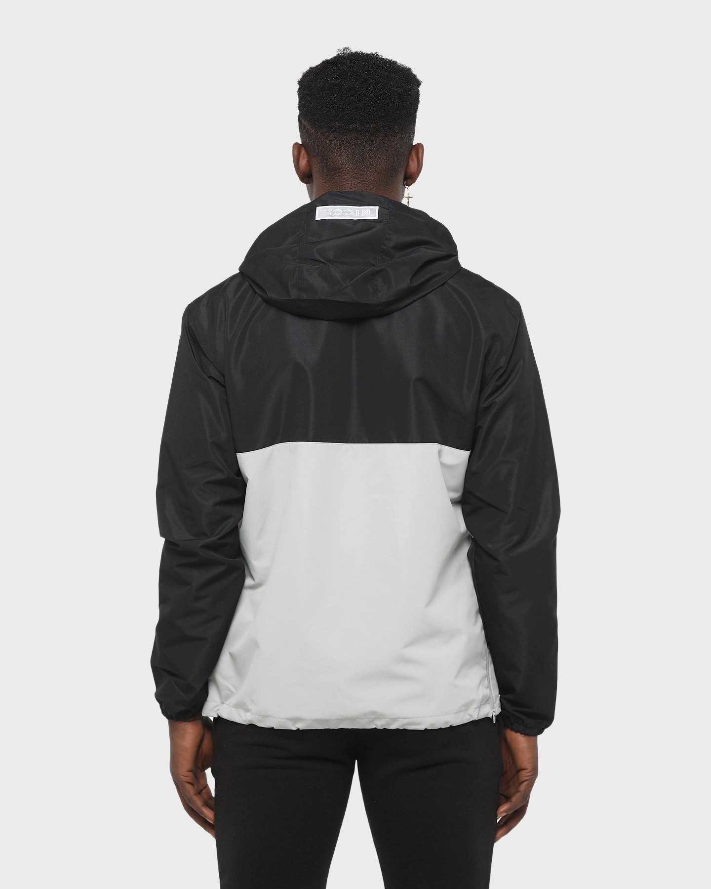 Nicce Casta Cagoule Jacket Black/Stone MultiPocket Design Hint