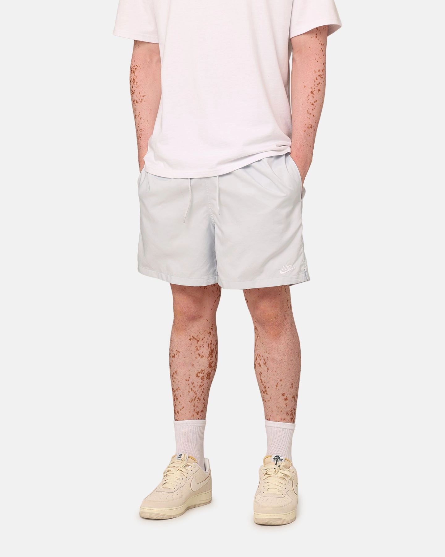 EcoFriendlyMaterials Flexible Pocket Placement Nike Club Flow Shorts Pure Platinum