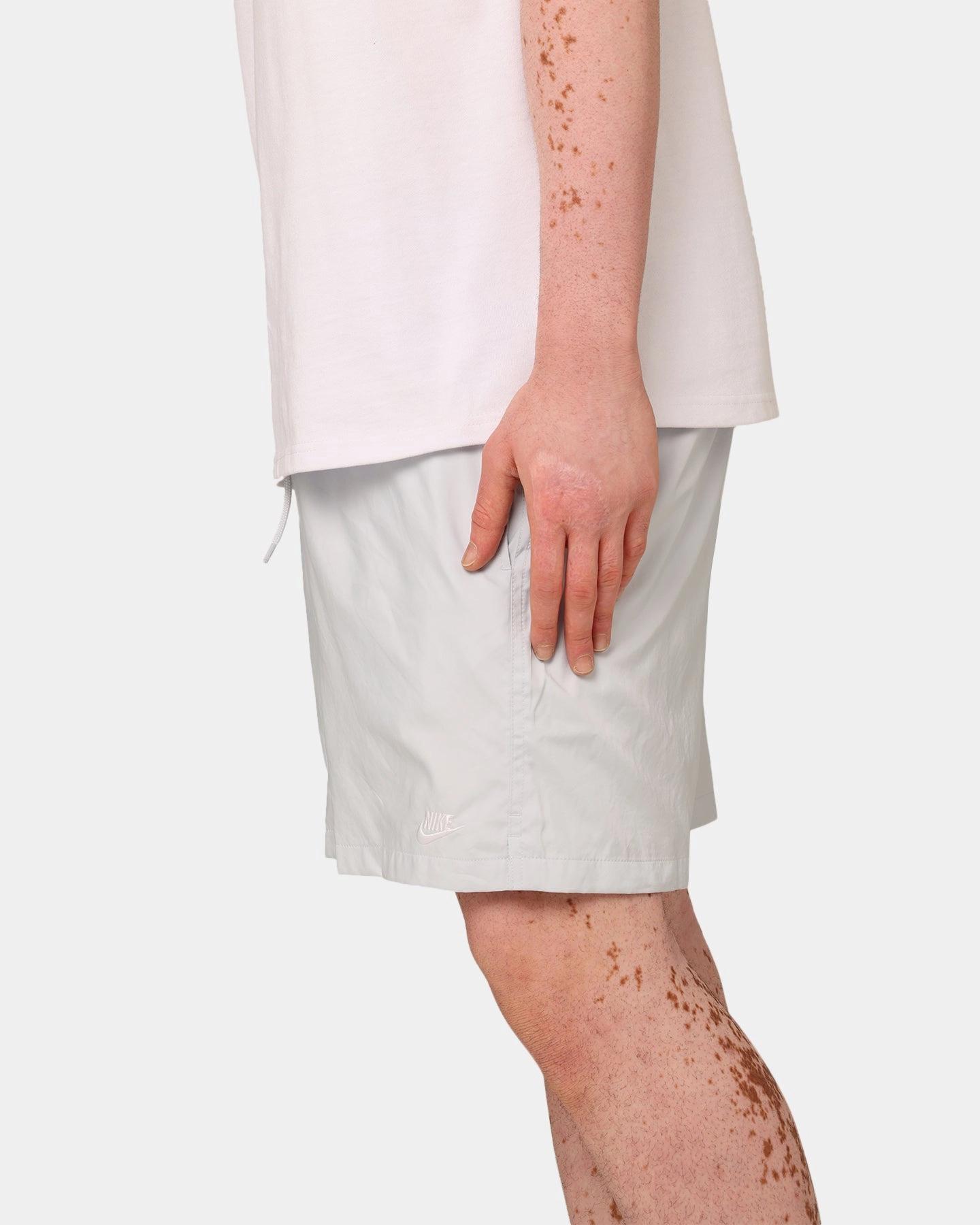 Nike Club Flow Shorts Pure Platinum stripe design