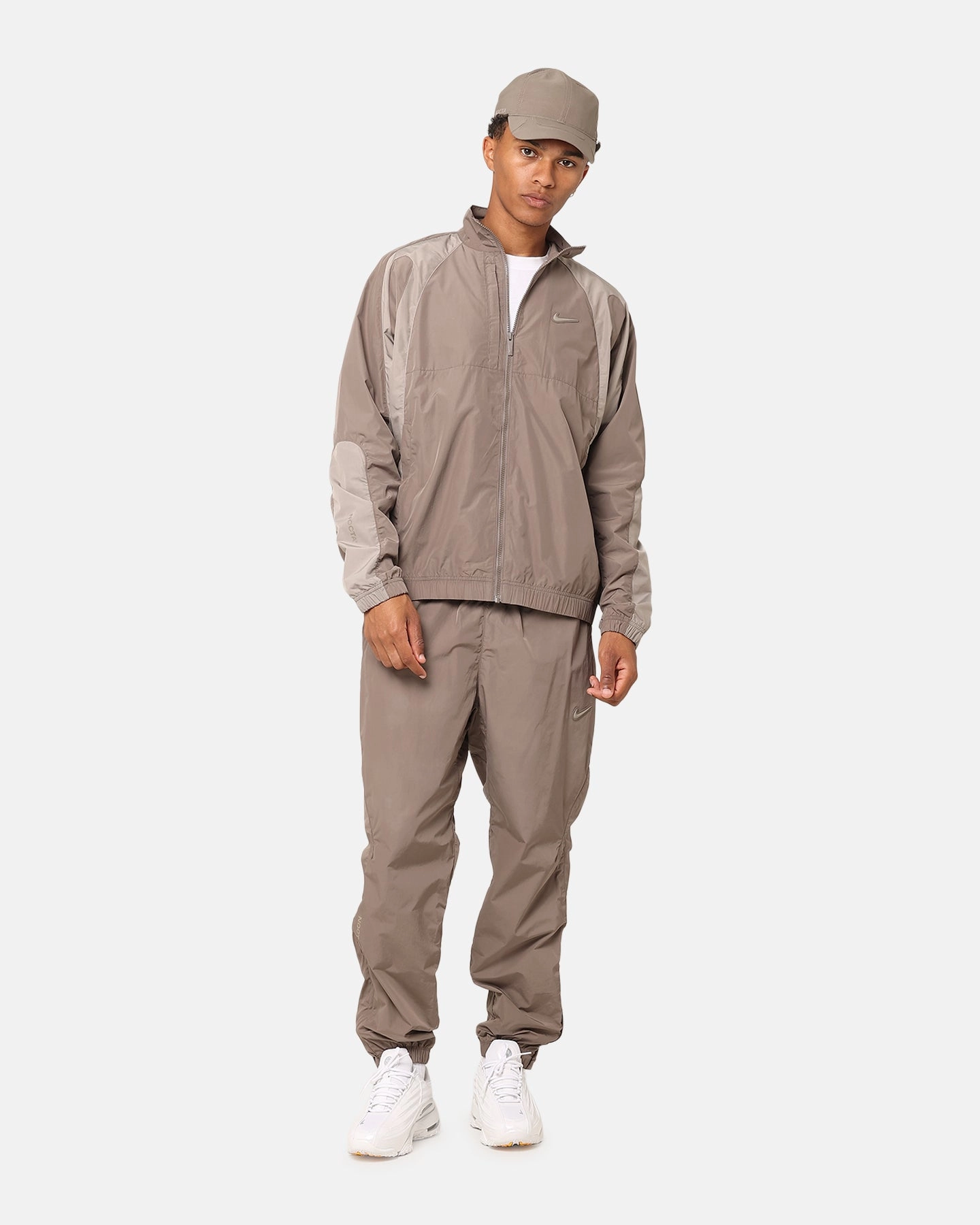 Nike Nocta Northstar Nylon Track Jacket Olive Grey Flexible Zipper System Windproof Outer Layer