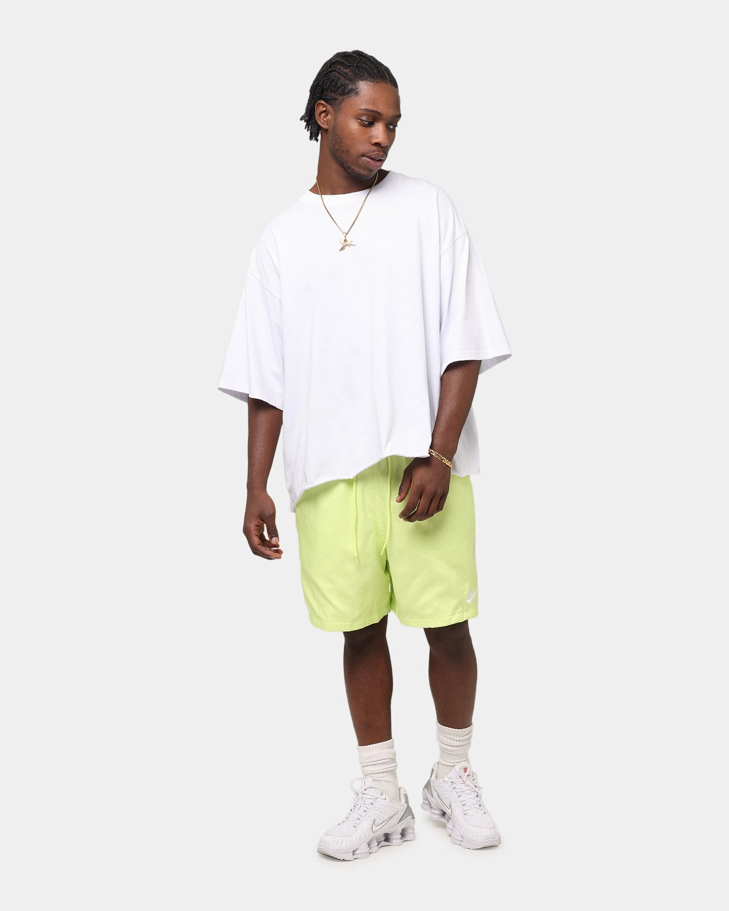 Fashionable Look beach goers Nike Club Flow Shorts Lemon
