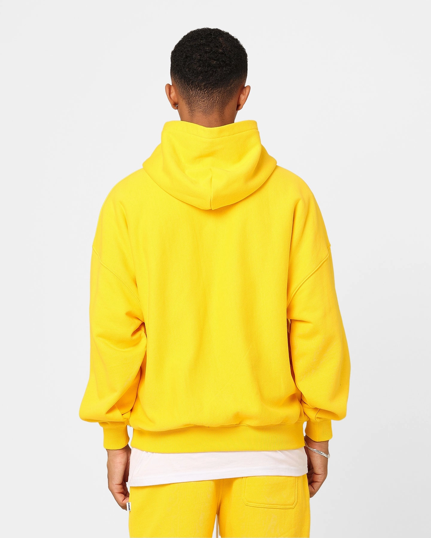 Carre 2K Oversized Hoodie Yellow middle aged people city lights
