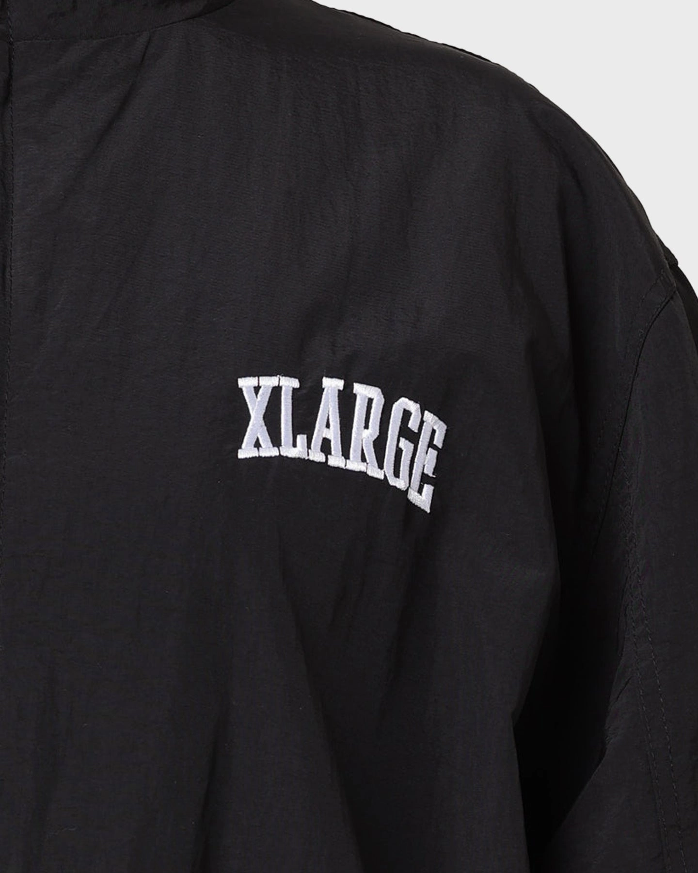XLARGE Arched Track Jacket Black Pilates Music