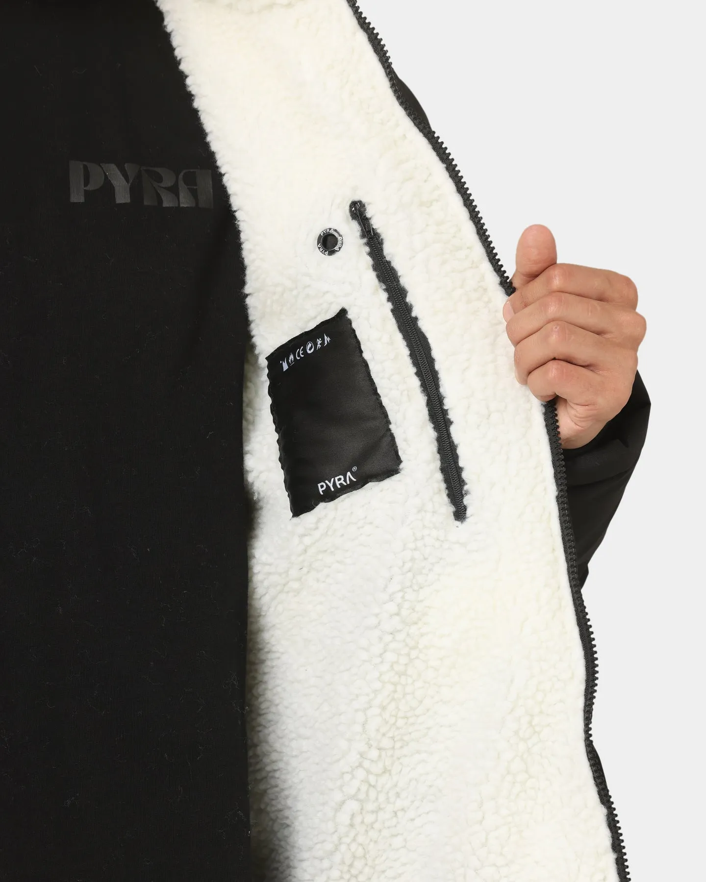 PYRA Sherpa Puffa Jacket Black/White suitable for air sports Functional Wear