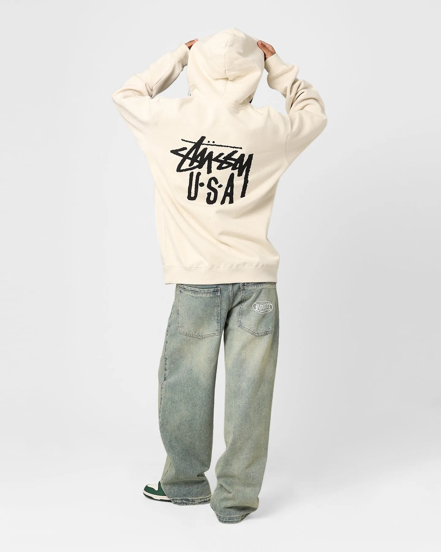 Stussy USA LCB Hoodie Cream Discuss Compression Strap Adjustment