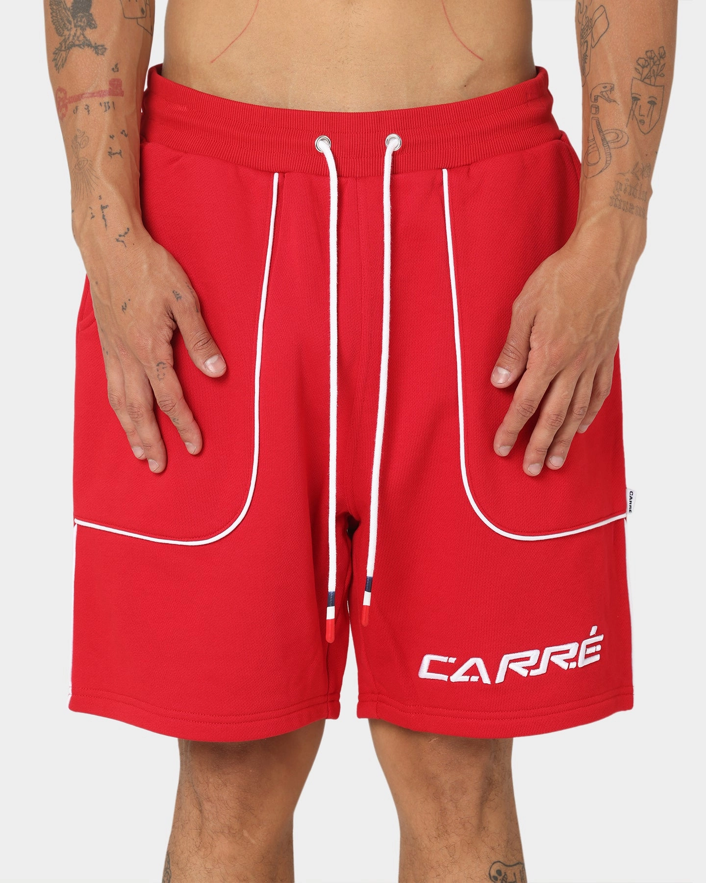 Preppy look skateboarding gear Carre Ange Track Shorts Red