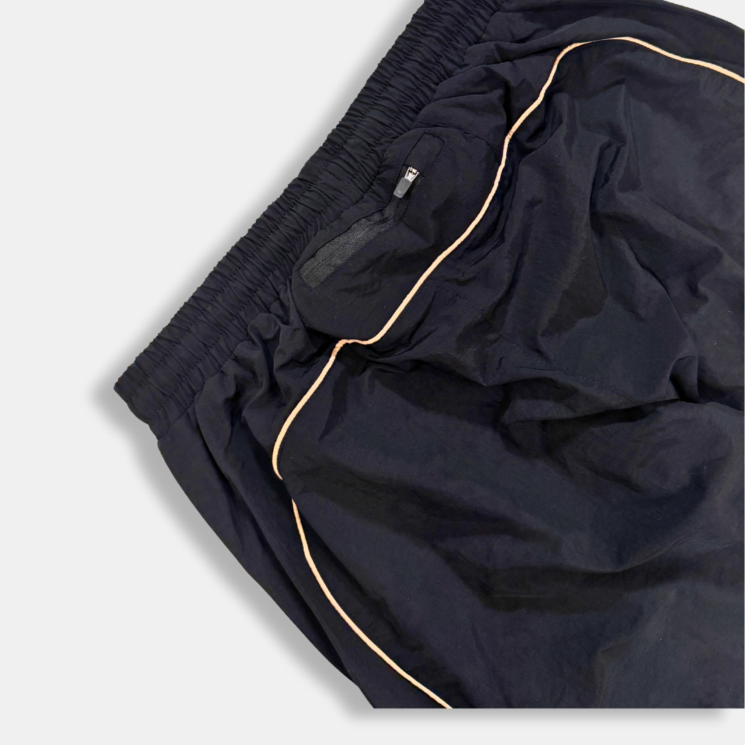 Syna x CRG Shell Tracksuit - Black & Rose Gold wide-leg fit