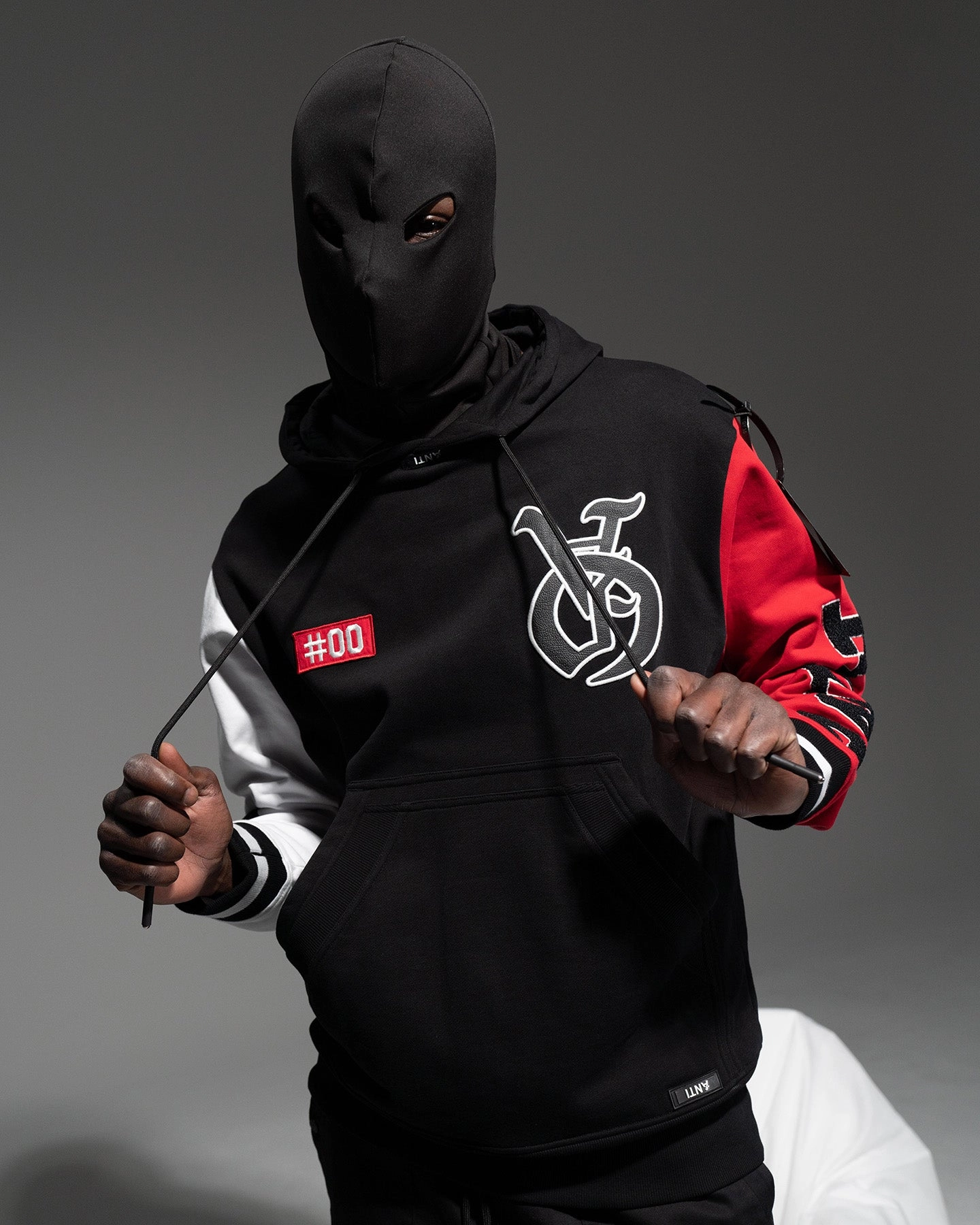 The Anti Order Antidote College Hoodie Black/White/Red Fearlessness
