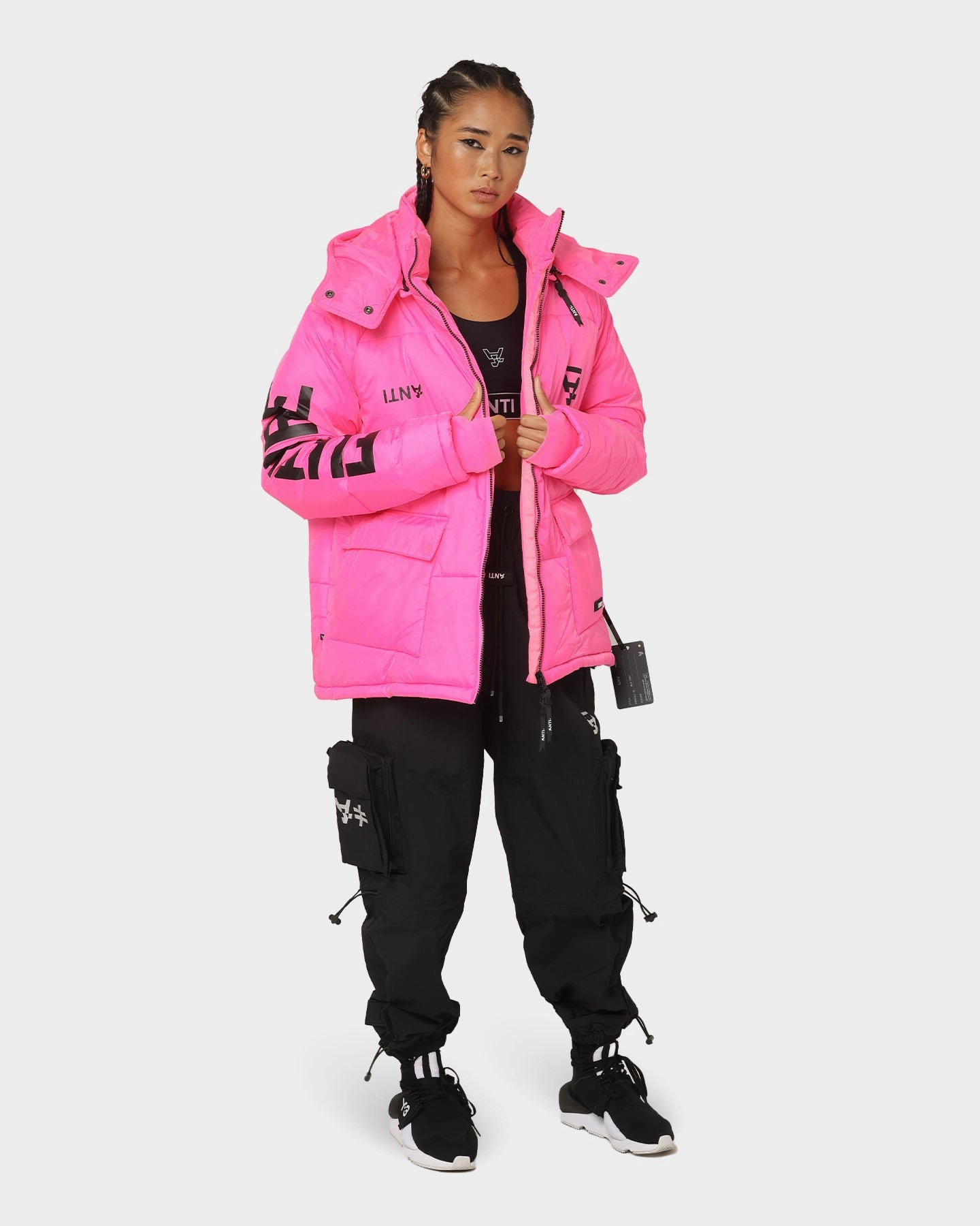 The Anti Order Hyphen ATD Puffer Jacket Lethal Pink cyclist