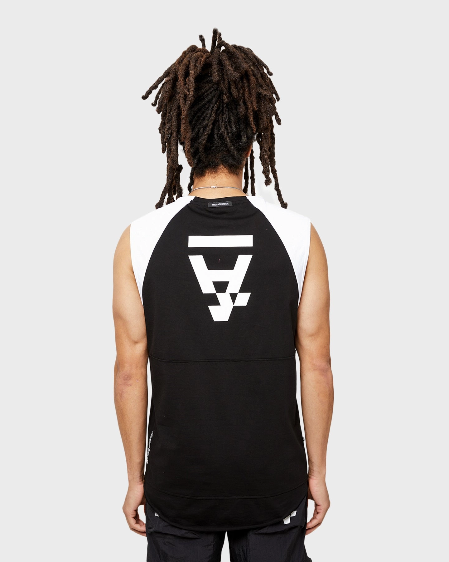 The Anti Order Unknown Singlet Black/White Moisture Wicking Fabric Hypoallergenic fabric