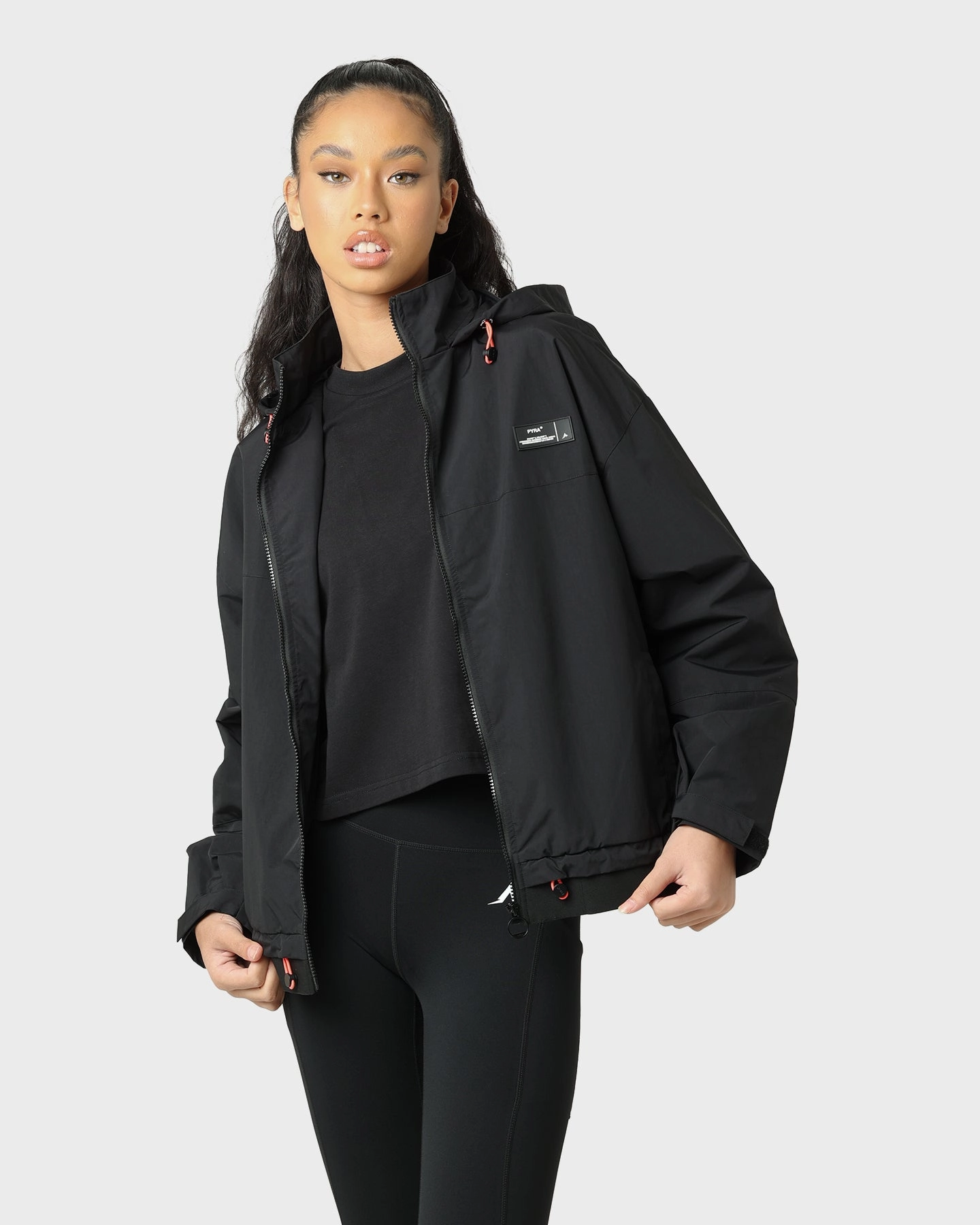 Report Taped Zipper Closures PYRA Women's Elements Wind Breaker Black/Pink