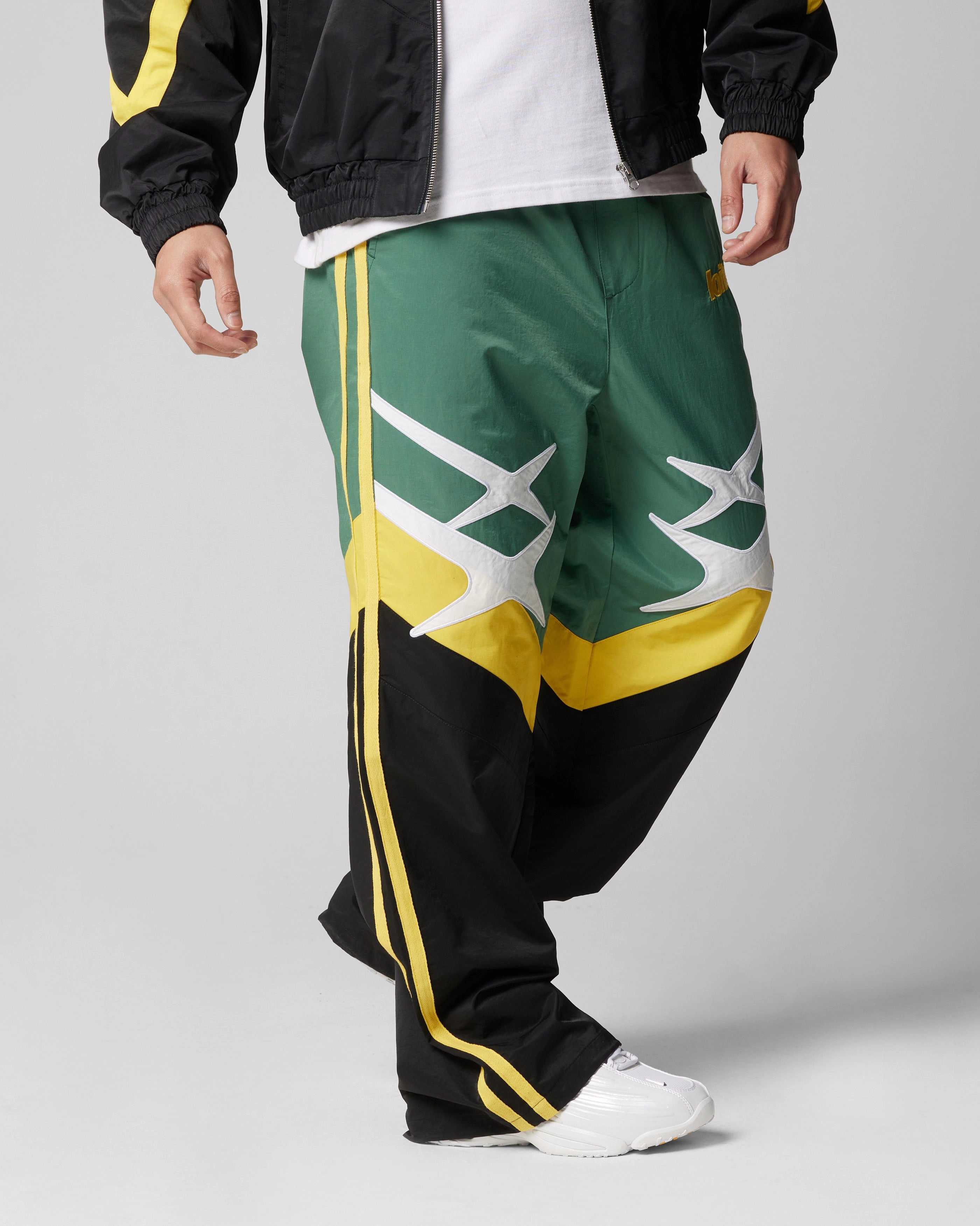 Loiter Hybrid Trackpants Green/Yellow elastic waistband Relaxed Design