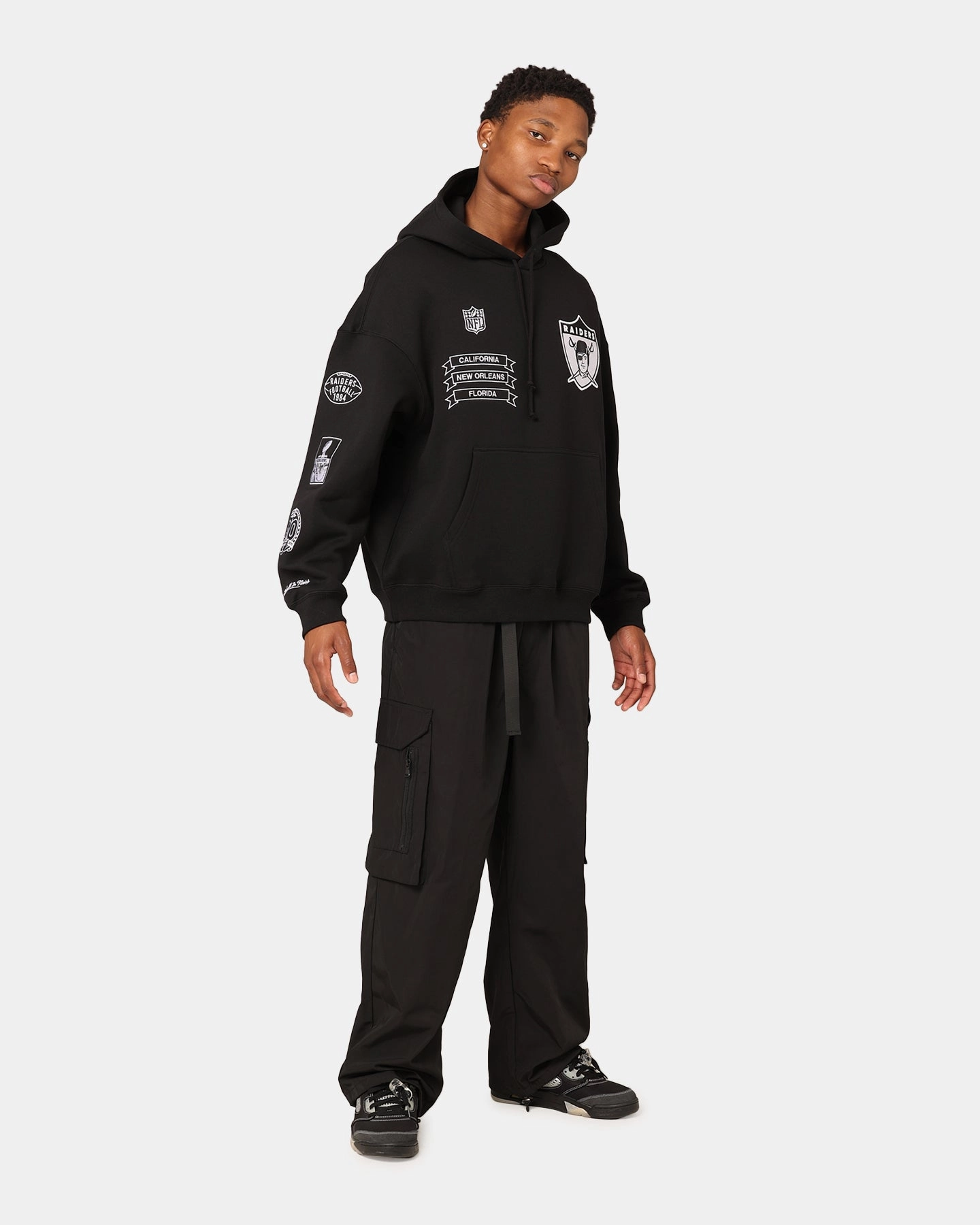 Badge Mitchell & Ness Los Angeles Raiders History Hoodie Faded Black